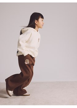 Reserved - Spodnie dresowe Pusheen - ciemnobrązowy ze sklepu Reserved w kategorii Spodnie dziewczęce - zdjęcie 188155136