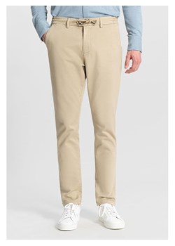 DSTREZZED Spodnie chino w kolorze kremowym ze sklepu Limango Polska w kategorii Spodnie męskie - zdjęcie 188208627