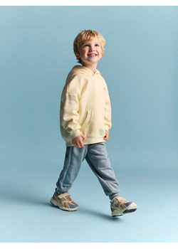 Reserved - Bawełniane spodnie jogger - jasnoniebieski ze sklepu Reserved w kategorii Spodnie chłopięce - zdjęcie 188248418