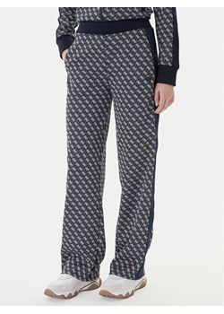 Guess Spodnie dresowe V6RB09 K2042 Granatowy Wide Leg ze sklepu MODIVO w kategorii Spodnie damskie - zdjęcie 188256059