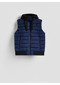 Reserved - Pikowana kamizelka z kapturem - niebieski ze sklepu Reserved w kategorii Kamizelki męskie - zdjęcie 188265338