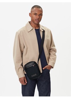 Tommy Hilfiger Saszetka Th Nylon Mini Reporter AM0AM13618 Czarny ze sklepu MODIVO w kategorii Torby męskie - zdjęcie 188277447