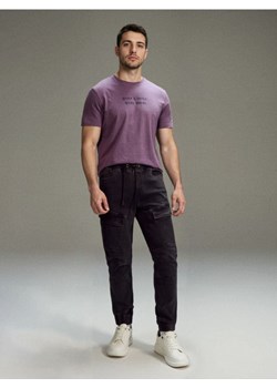 Sinsay - Spodnie jogger slim fit - czarny ze sklepu Sinsay w kategorii Jeansy męskie - zdjęcie 188313826