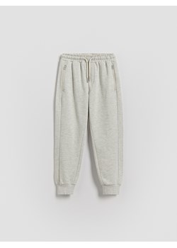 Reserved - Bawełniane joggery - beżowy ze sklepu Reserved w kategorii Spodnie chłopięce - zdjęcie 188360867