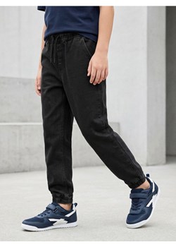 Sinsay - Jeansy jogger z efektem sprania - czarny ze sklepu Sinsay w kategorii Spodnie chłopięce - zdjęcie 188389366