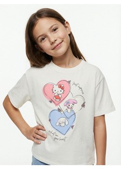 Sinsay - Bawełniana koszulka z nadrukiem Hello Kitty - kremowy ze sklepu Sinsay w kategorii Bluzki dziewczęce - zdjęcie 188389508