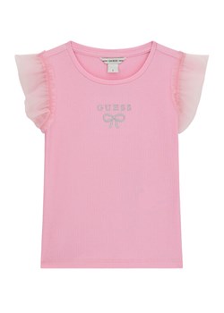 Guess T-Shirt K6RI12 KCU20 Różowy Regular Fit ze sklepu MODIVO w kategorii Bluzki dziewczęce - zdjęcie 188401509