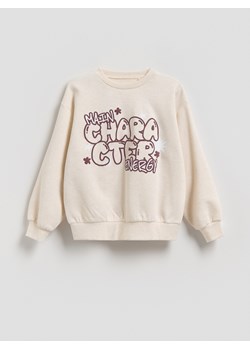 Reserved - Luźna bluza z napisem - kremowy ze sklepu Reserved w kategorii Bluzy dziewczęce - zdjęcie 188406007