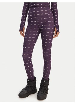 adidas Legginsy Moon Boot JM1102 Fioletowy Slim Fit ze sklepu MODIVO w kategorii Spodnie damskie - zdjęcie 188412249
