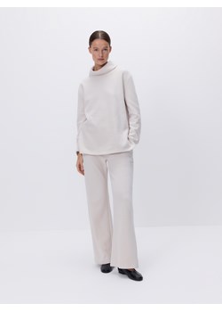 Reserved - Dzianinowe spodnie z bawełną - beżowy ze sklepu Reserved w kategorii Spodnie damskie - zdjęcie 188425387