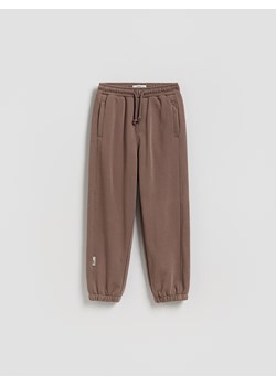 Reserved - Bawełniane spodnie jogger - brązowy ze sklepu Reserved w kategorii Spodnie chłopięce - zdjęcie 188460695