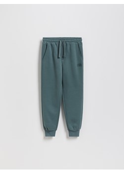 Reserved - Bawełniane joggery z meszkiem - zielony ze sklepu Reserved w kategorii Spodnie chłopięce - zdjęcie 188470186