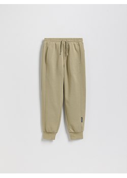 Reserved - Bawełniane joggery z meszkiem - oliwkowy ze sklepu Reserved w kategorii Spodnie chłopięce - zdjęcie 188470219