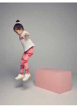 Reserved - Bawełniane legginsy z nadrukiem - różowy ze sklepu Reserved w kategorii Spodnie dziewczęce - zdjęcie 188470435