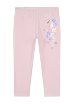 Guess Legginsy K6RB04 J1314 Różowy Slim Fit ze sklepu MODIVO w kategorii Spodnie dziewczęce - zdjęcie 188472048