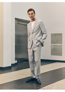 Reserved - Spodnie garniturowe z dodatkiem wiskozy - jasnoszary ze sklepu Reserved w kategorii Spodnie męskie - zdjęcie 188472826