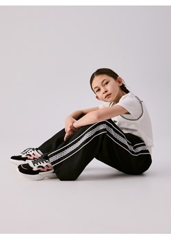 Reserved - Spodnie z koronkowymi lampasami - czarny ze sklepu Reserved w kategorii Spodnie dziewczęce - zdjęcie 188476178