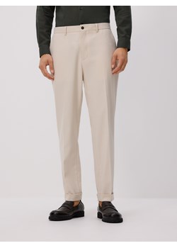 Reserved - Spodnie garniturowe z wiskozą - beżowy ze sklepu Reserved w kategorii Spodnie męskie - zdjęcie 188476199