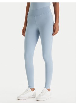 Guess Legginsy V6RB11 KD952 Niebieski Slim Fit ze sklepu MODIVO w kategorii Spodnie damskie - zdjęcie 188506147