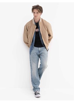 Guess Jeans Kurtka przejściowa 180532 Beżowy Classic Fit ze sklepu MODIVO w kategorii Kurtki męskie - zdjęcie 188506227