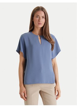 Calvin Klein Bluzka LV044E902G Błękitny Regular Fit ze sklepu MODIVO w kategorii Bluzki damskie - zdjęcie 188512677