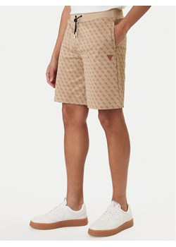 Guess Szorty sportowe Z4YD03 K7122 Beżowy Regular Fit ze sklepu MODIVO w kategorii Spodenki męskie - zdjęcie 188513087