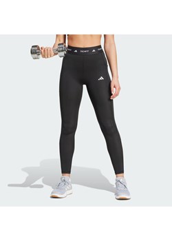 adidas Legginsy TECHFIT Stash Pocket IT2282 Czarny Slim Fit ze sklepu MODIVO w kategorii Spodnie damskie - zdjęcie 188513266