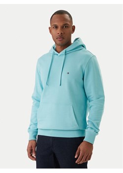 Tommy Hilfiger Bluza Essential MW0MW37235 Turkusowy Regular Fit ze sklepu MODIVO w kategorii Bluzy męskie - zdjęcie 188513408
