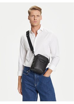 Tommy Hilfiger Saszetka AM0AM13546 Czarny ze sklepu MODIVO w kategorii Torby męskie - zdjęcie 188513435