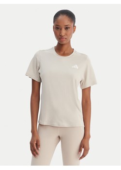 adidas Koszulka techniczna Train Essentials 3-Stripes Workout JD6530 Beżowy Regular Fit ze sklepu MODIVO w kategorii Bluzki damskie - zdjęcie 188513588