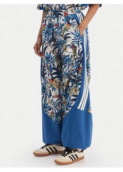 adidas Spodnie dresowe Farm Rio Premium KD4643 Niebieski Loose Fit ze sklepu MODIVO w kategorii Spodnie damskie - zdjęcie 188513778
