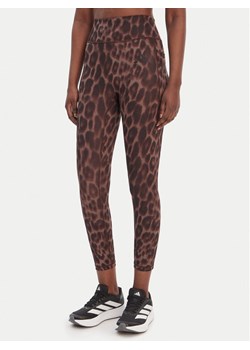 adidas Legginsy Optime Essentials Workout KA6346 Brązowy Slim Fit ze sklepu MODIVO w kategorii Spodnie damskie - zdjęcie 188513839