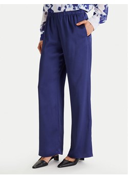 Calvin Klein Spodnie materiałowe LV044F611G Granatowy Regular Fit ze sklepu MODIVO w kategorii Spodnie damskie - zdjęcie 188514709