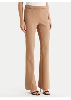 Marciano Guess Spodnie materiałowe 6RGB12 9373Z Beżowy Regular Fit ze sklepu MODIVO w kategorii Spodnie damskie - zdjęcie 188514957
