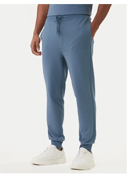 HUGO Spodnie dresowe Dayote232 50489617 Niebieski Regular Fit ze sklepu MODIVO w kategorii Spodnie męskie - zdjęcie 188515016