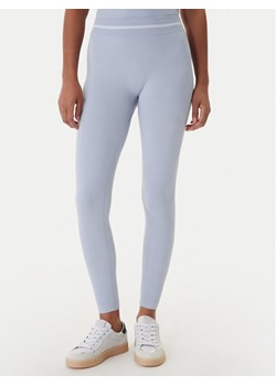 Guess Legginsy V6RB05 Z4692 Błękitny Slim Fit ze sklepu MODIVO w kategorii Spodnie damskie - zdjęcie 188515049