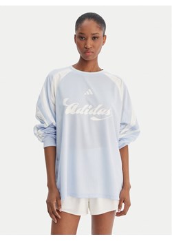 adidas Bluzka House Of Tiro JY7639 Błękitny Loose Fit ze sklepu MODIVO w kategorii Bluzki damskie - zdjęcie 188515117