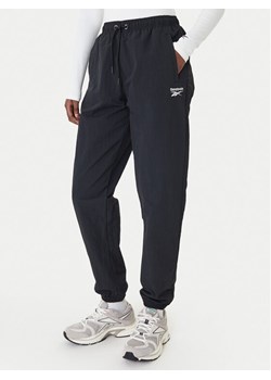 Reebok Spodnie dresowe Galina RK25518CCW Czarny Relaxed Fit ze sklepu MODIVO w kategorii Spodnie damskie - zdjęcie 188515187