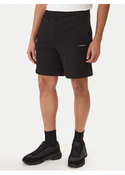 Calvin Klein Szorty sportowe Nano Logo LV04LF244G Czarny Regular Fit ze sklepu MODIVO w kategorii Spodenki męskie - zdjęcie 188515347