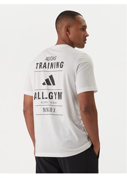 adidas T-Shirt Category Training Graphic JM8976 Écru Regular Fit ze sklepu MODIVO w kategorii T-shirty męskie - zdjęcie 188515376