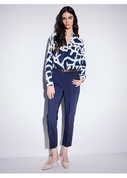 Mohito - Granatowe spodnie z paskiem - granatowy ze sklepu Mohito w kategorii Spodnie damskie - zdjęcie 188529646