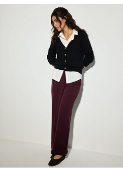 Mohito - Spodnie z paskiem - mahoń ze sklepu Mohito w kategorii Spodnie damskie - zdjęcie 188530089