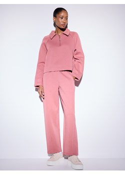 Mohito - Różowe spodnie dresowe - różowy ze sklepu Mohito w kategorii Spodnie damskie - zdjęcie 188530378