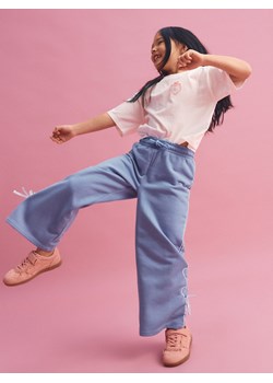 Reserved - Spodnie dresowe z kokardkami - jasnoturkusowy ze sklepu Reserved w kategorii Spodnie dziewczęce - zdjęcie 188535016