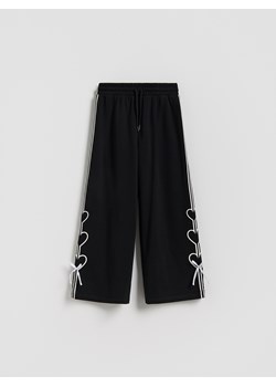 Reserved - Spodnie dresowe z kokardkami - czarny ze sklepu Reserved w kategorii Spodnie dziewczęce - zdjęcie 188535025