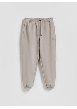 Reserved - Spodnie dresowe comfort fit - beżowy ze sklepu Reserved w kategorii Spodnie męskie - zdjęcie 188536945