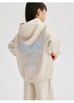 Reserved - Bluza z napisem na plecach - beżowy ze sklepu Reserved w kategorii Bluzy dziewczęce - zdjęcie 188539156