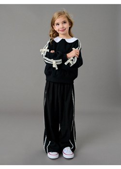 Sinsay - Spodnie tkaninowe z ozdobną koronką - czarny ze sklepu Sinsay w kategorii Spodnie dziewczęce - zdjęcie 188542465