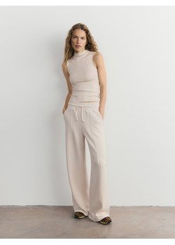 Reserved - Dresowe spodnie - kremowy ze sklepu Reserved w kategorii Spodnie damskie - zdjęcie 188547036