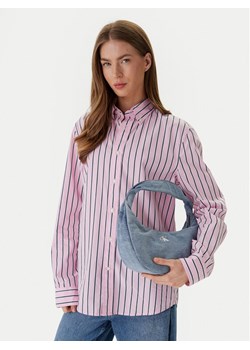 Calvin Klein Torebka Denim Soft Crescent Sm LV04F3207G Niebieski ze sklepu MODIVO w kategorii Torebki damskie - zdjęcie 188644285